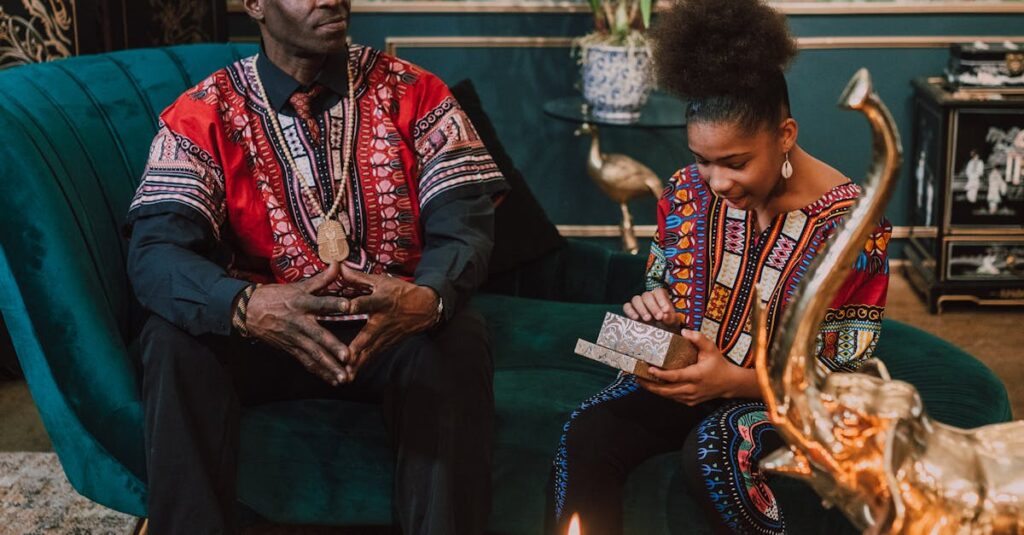 Why Handmade Gifts Matter More During the Holidays African American father and child celebrating Kwanzaa at home